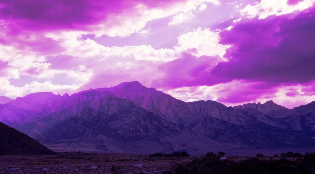 Purple mountains speak of the love of God